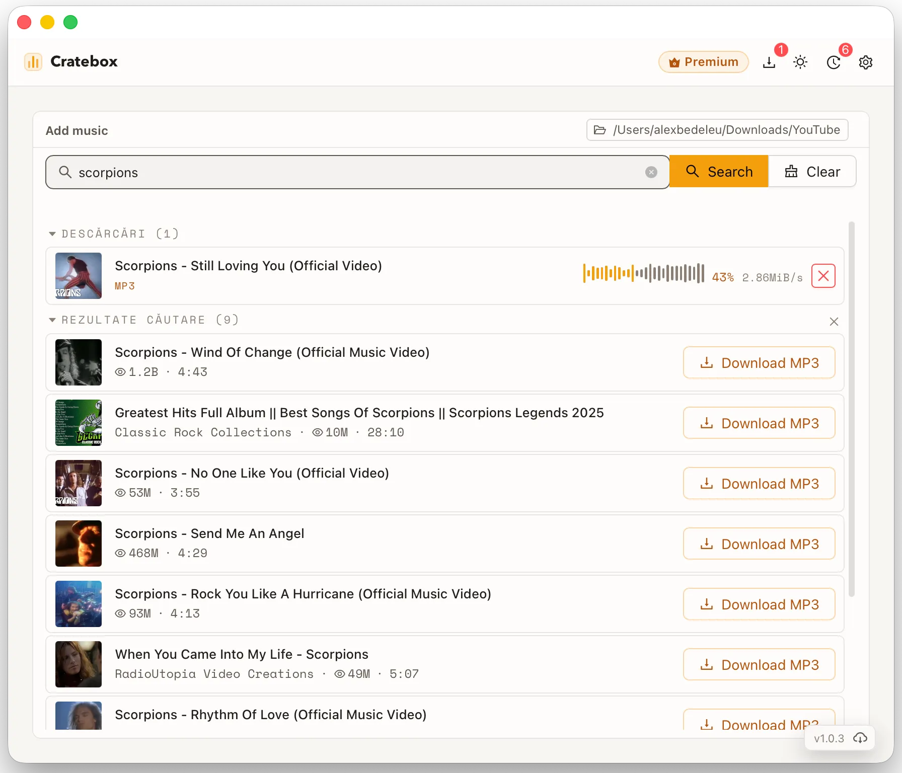 Cratebox light mode with search results and an active download